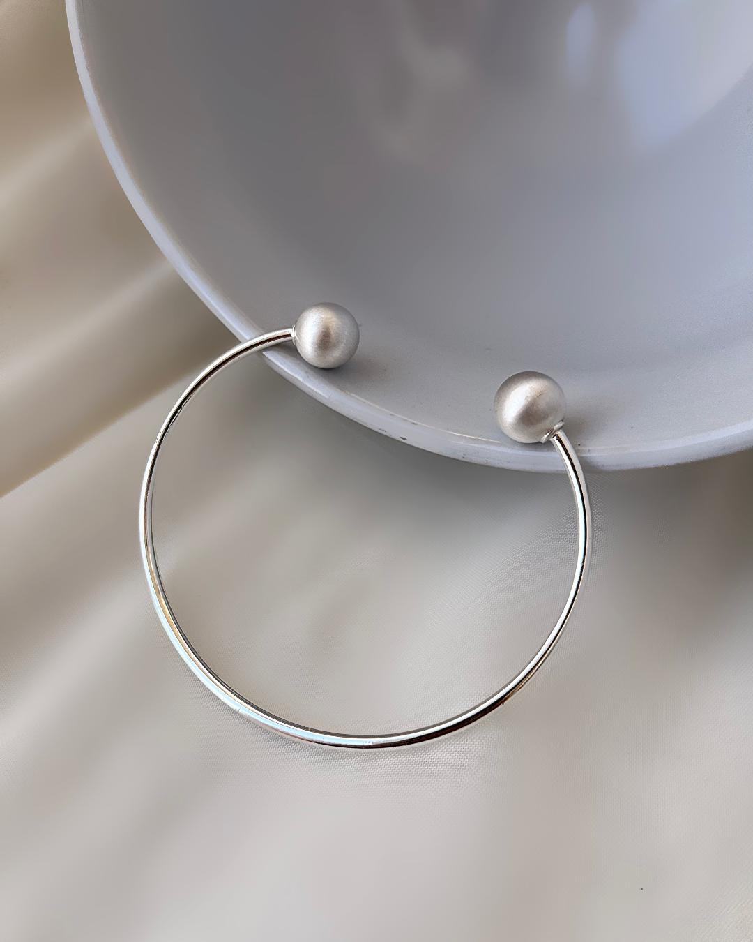 دست بند بنگل توپی زنانه c&a